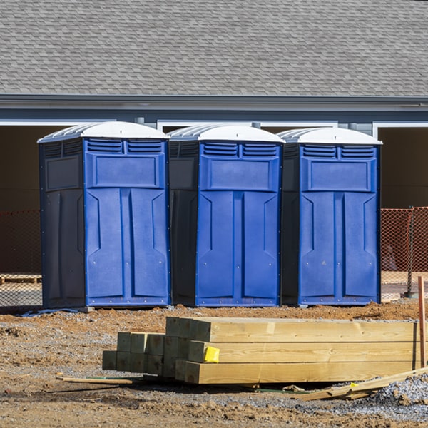 what is the cost difference between standard and deluxe portable restroom rentals in Donaldsonville